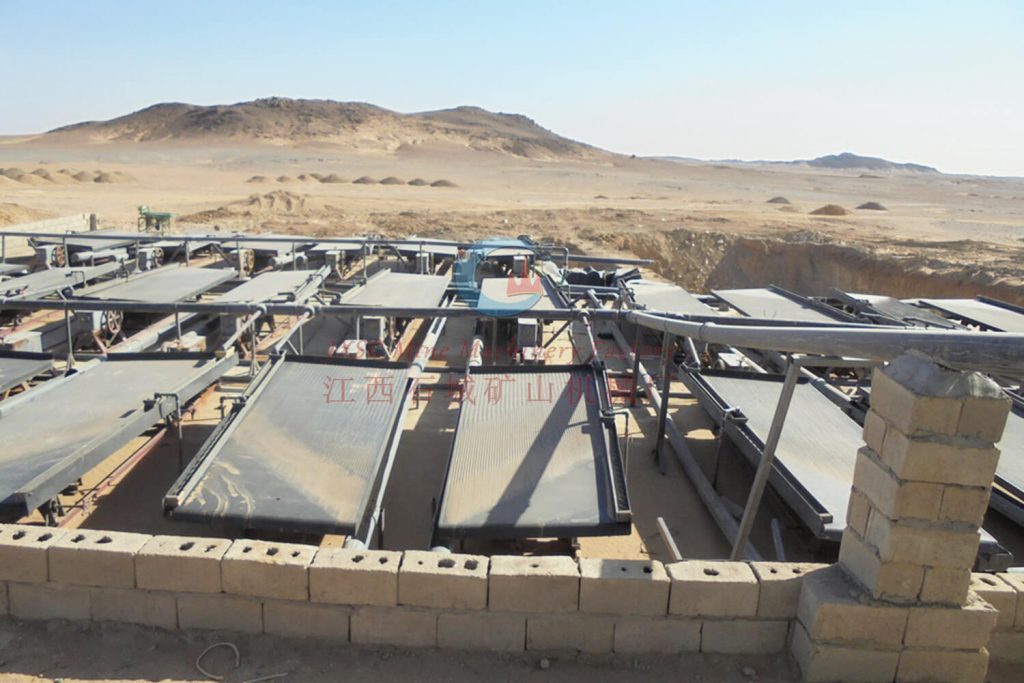 Multiple shaking table incubators connected in series